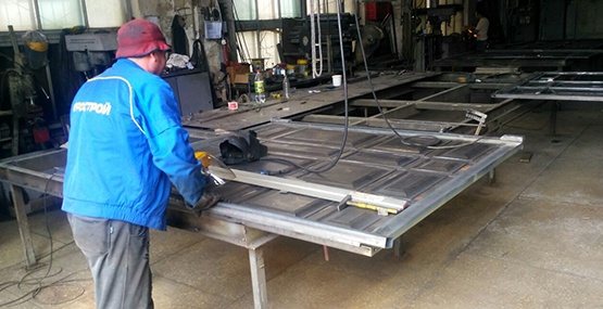 Зашивка ворот филенкой